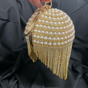 Gold with pearls and chains fancy little purse